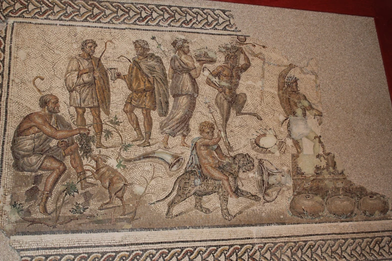 this is a picture of ancient mosaics with a horse and people