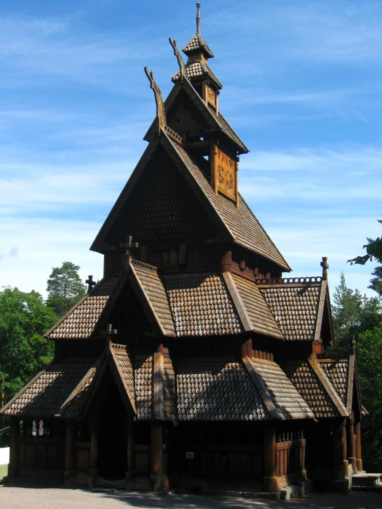 a big church with a tower and two clocks on it