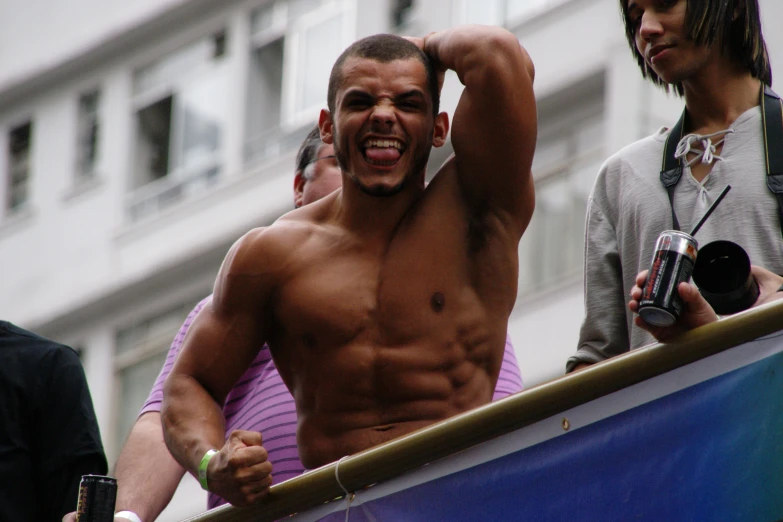 man in purple shorts and  in front of other men