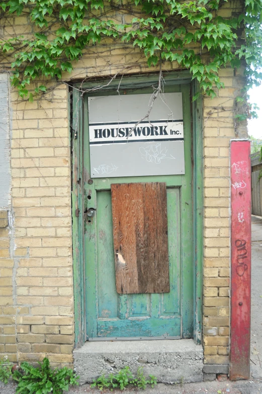 a doorway that has some signs on it