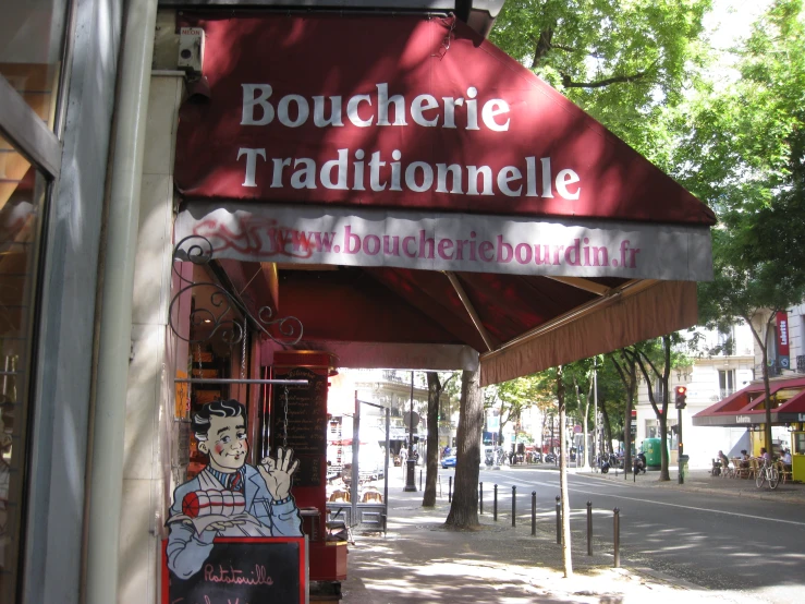 a red and white restaurant sign with a graphic on it