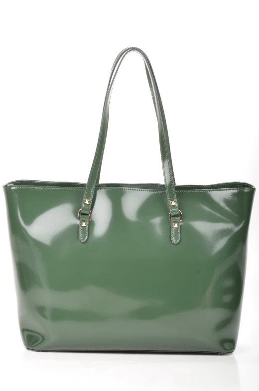 a green purse with a metal handle