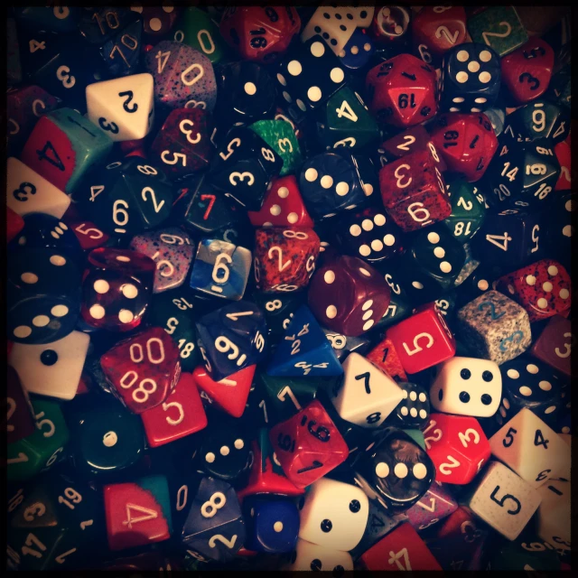 a number of dice laying on top of each other