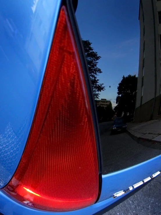 a close up of the tail light of a car