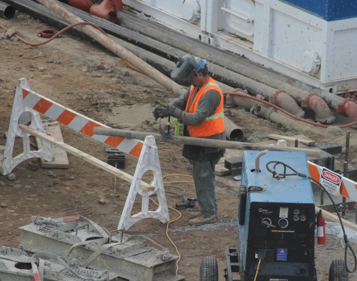 a construction worker is working in the ground