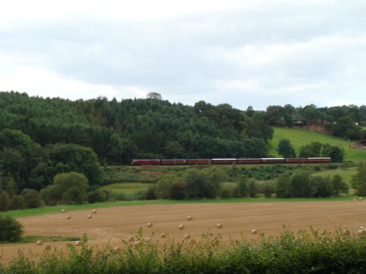 an image of a train driving down the tracks