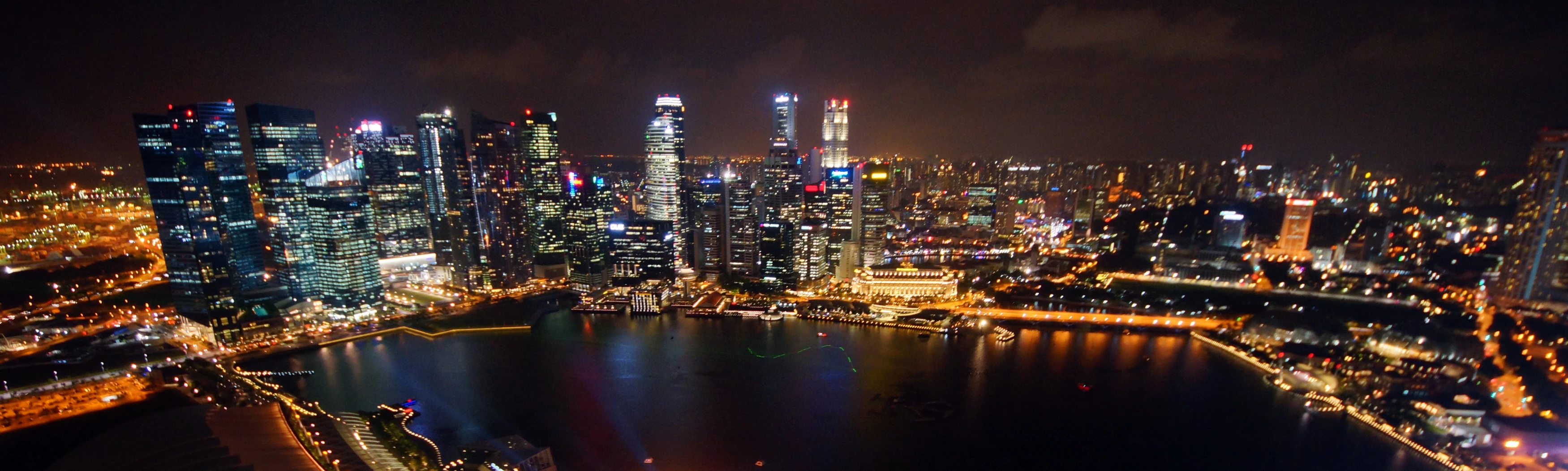 a large body of water surrounded by tall buildings