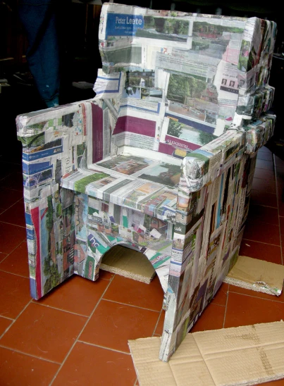 a very creative looking bench made out of magazines
