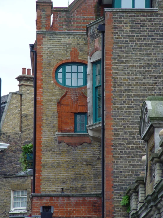 old brick building with window that is on right and top