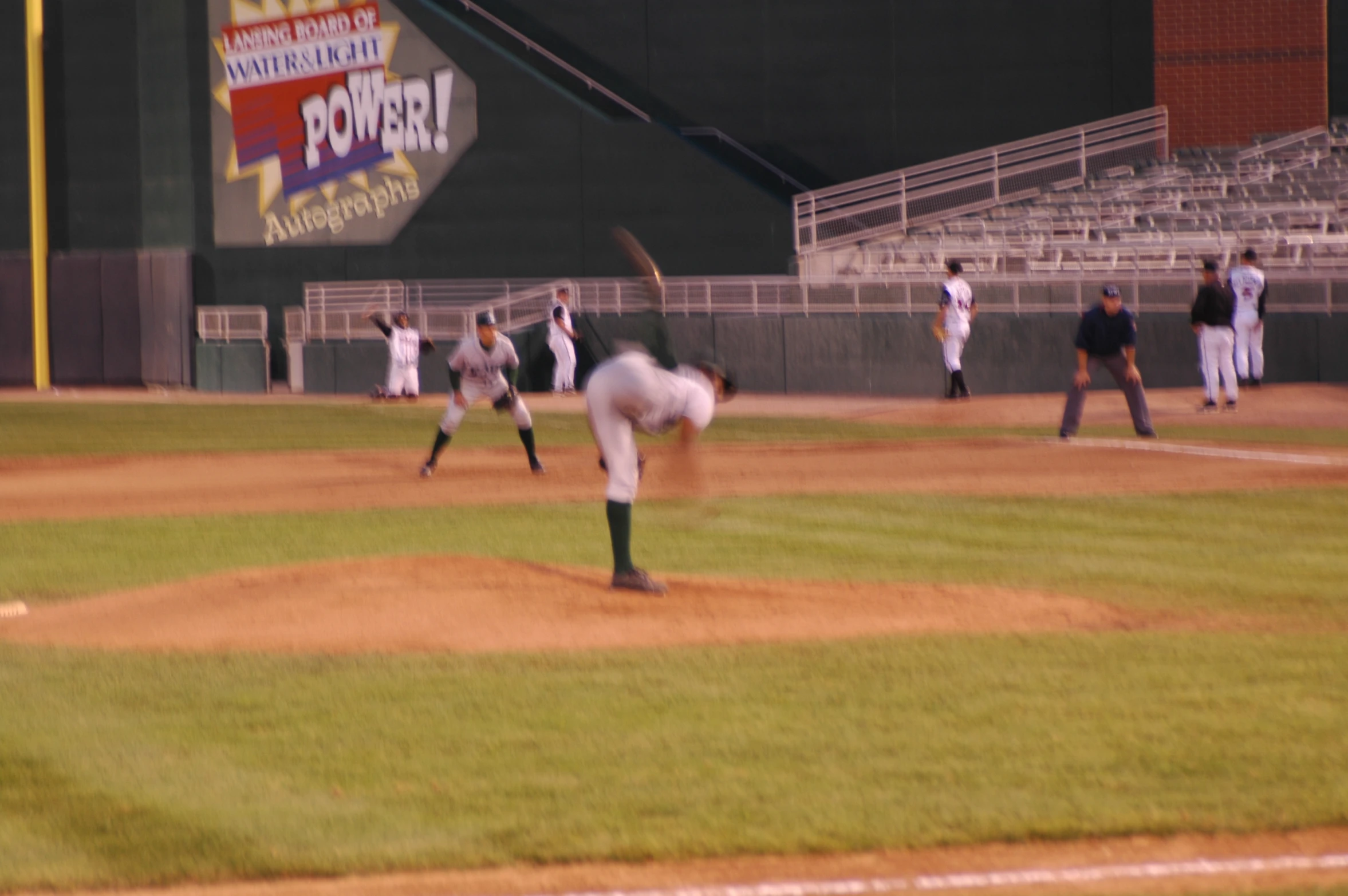 some baseball players are on the field in action