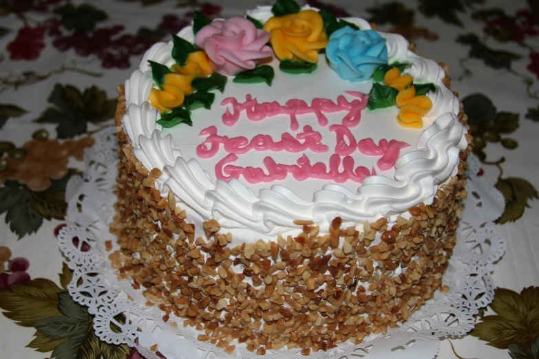 a decorated birthday cake is on the table