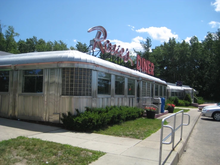 the diner is at a corner near the street