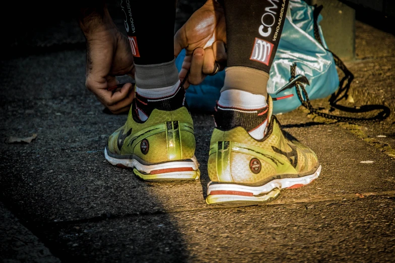 a close up of a person's shoe on the ground