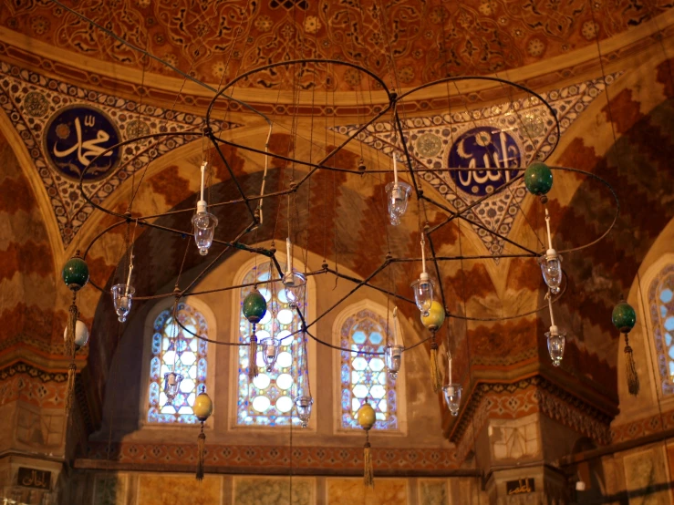 a large ornate wall and windows inside of a building