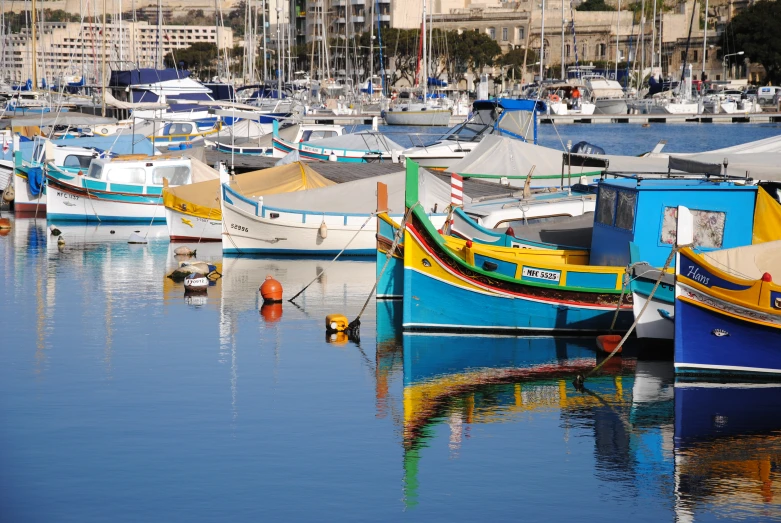 a group of boats docked in a harbor