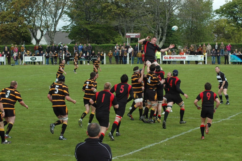 an rugby team is playing on a field