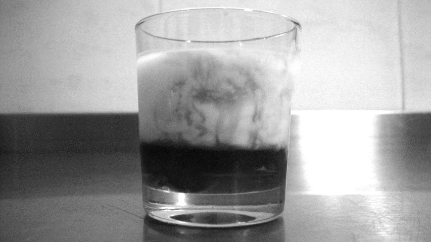 a s of liquid with a black and white background