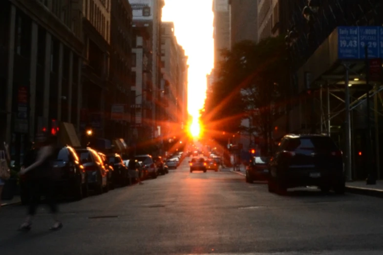 a street with a very tall building in the background