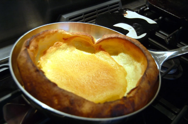 a heart shaped dish on a stove top