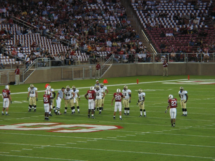 the opposing team looks on as they prepare to play against each other