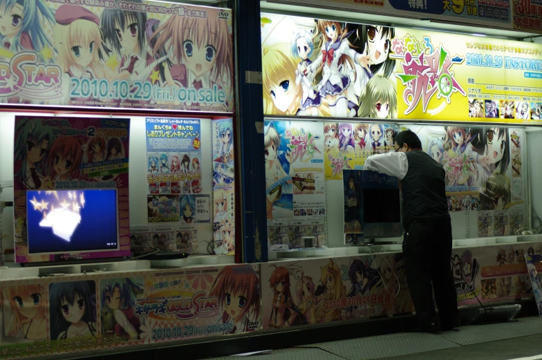 an anime store with its advertising showing