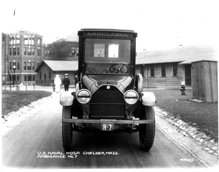a vintage po of a parked truck in a snow covered road