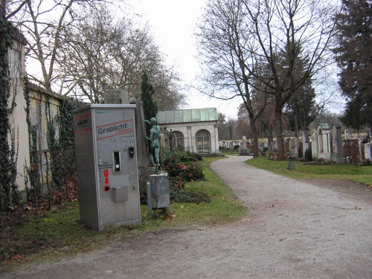 a small machine is in the middle of a cemetery