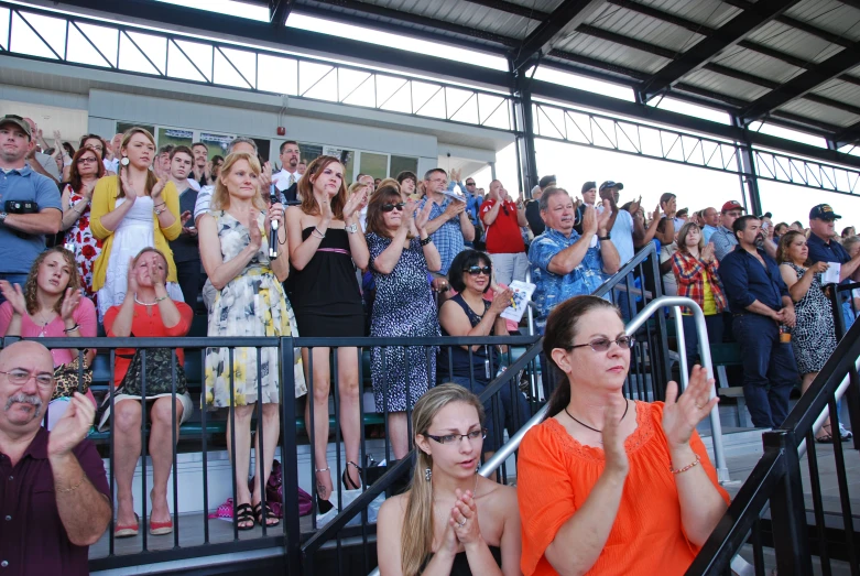 a group of people in line at an event