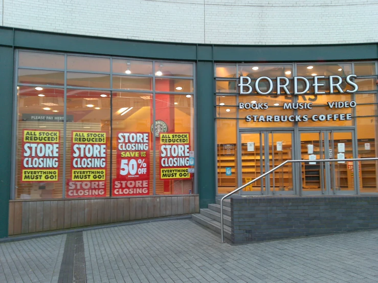 this store front is full of signage with some colors