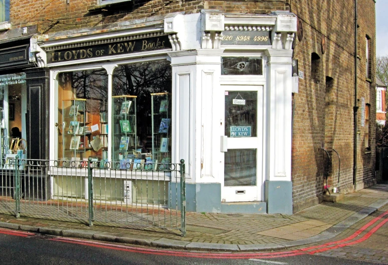 this old shop is on the corner of a street