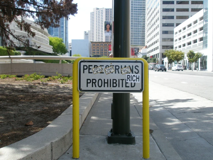 a sign for pedestrians has been placed at the street pole