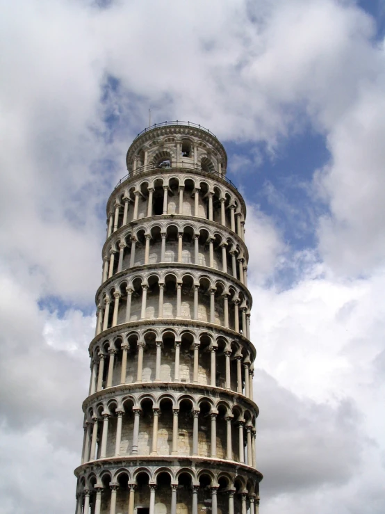 a tall white tower with a bunch of windows