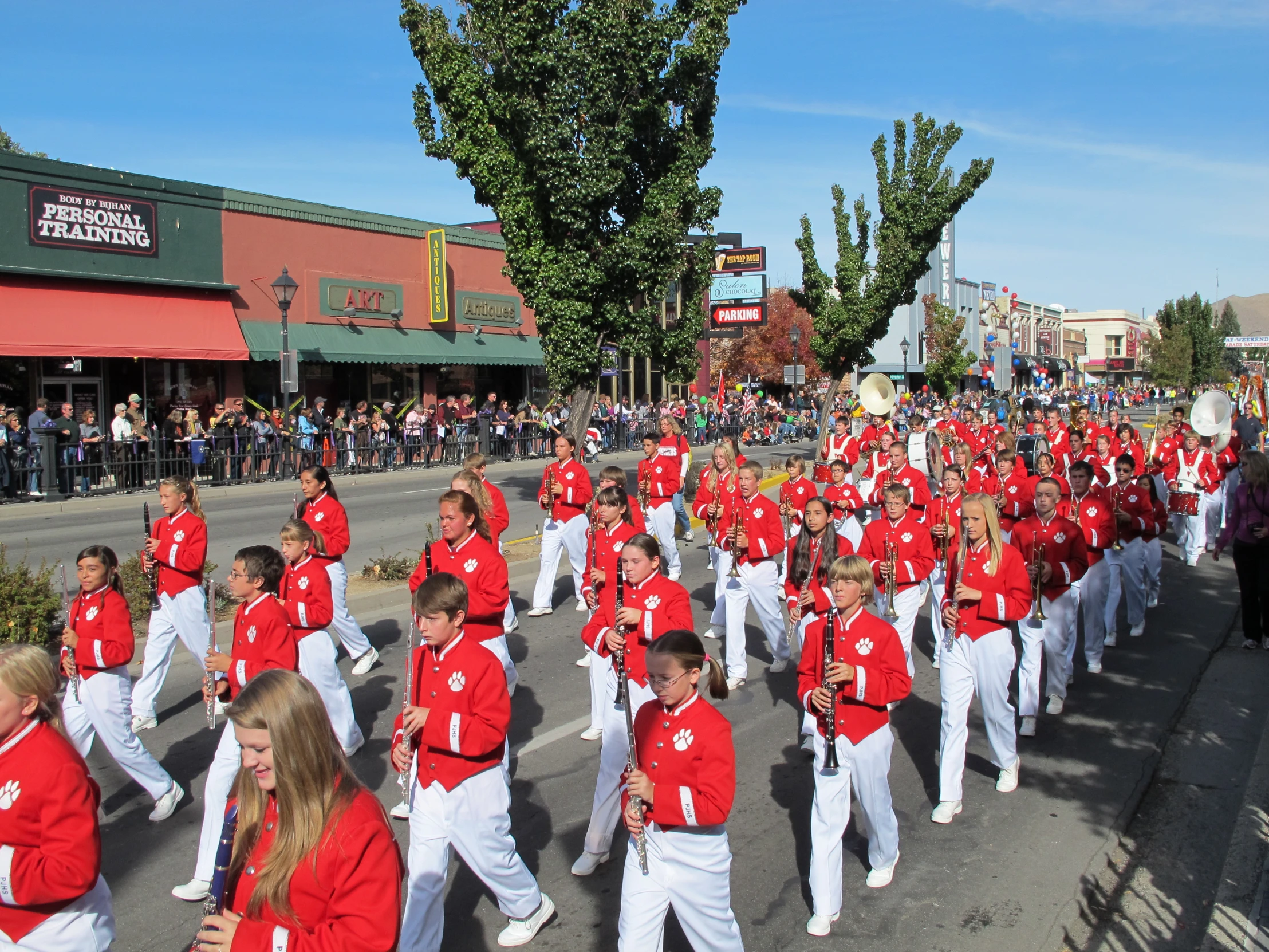 the crowd is dressed in red and white