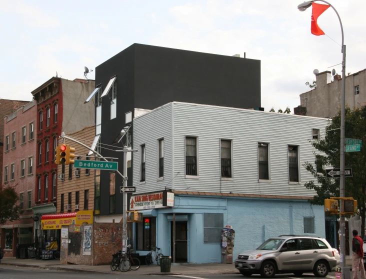 a blue building that looks like an old movie set