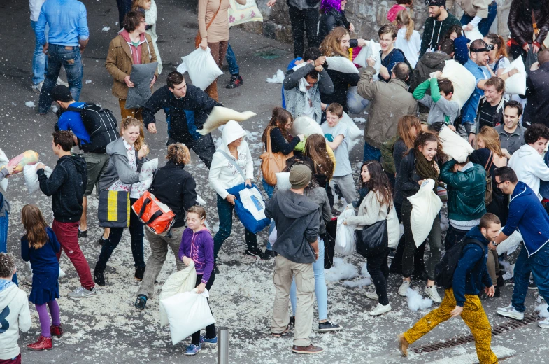 a crowd of people on the side of a road