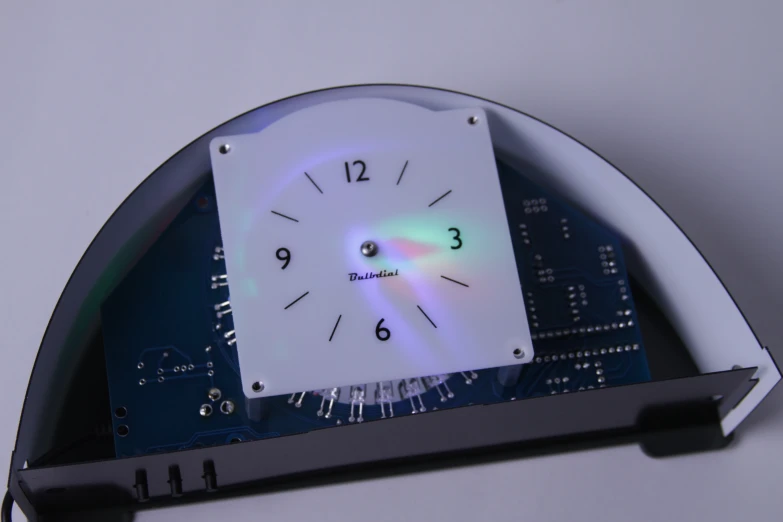 a clock is being displayed on a futuristic surface