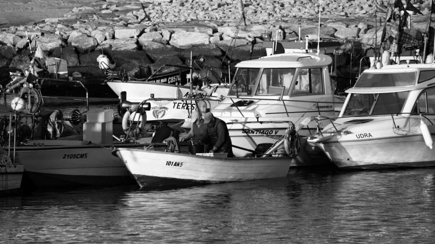 several boats are docked in the water