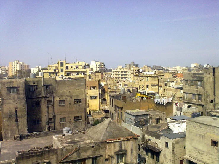 an aerial view of the rooftops of buildings in a neighborhood