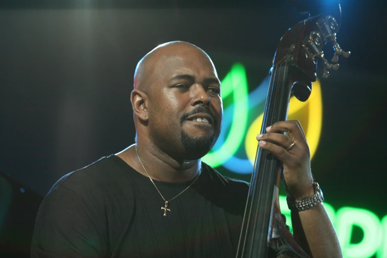 an image of a man that is playing bass