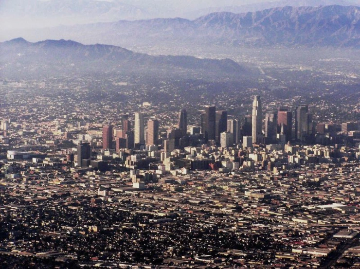 an aerial view of a large city with tall buildings