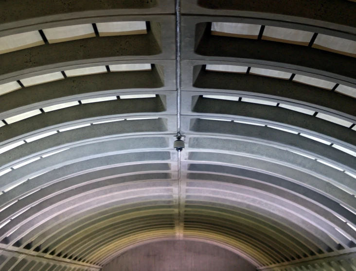 the ceiling in an empty building looks like it's from the outside