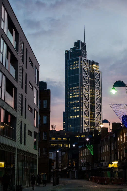 a view of the city with people walking around