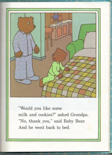 an old book with a bear and baby