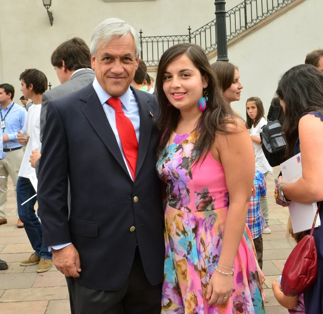 a man and woman pose for a picture together