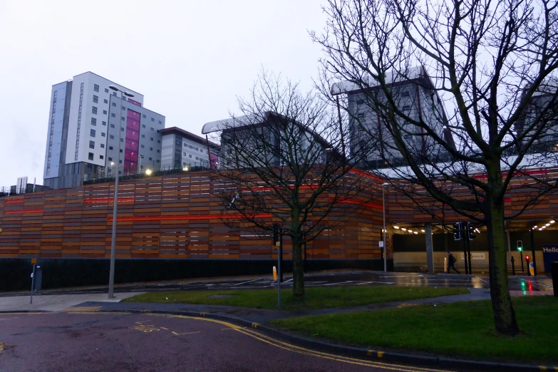 the building is covered in an unusually designed slat pattern