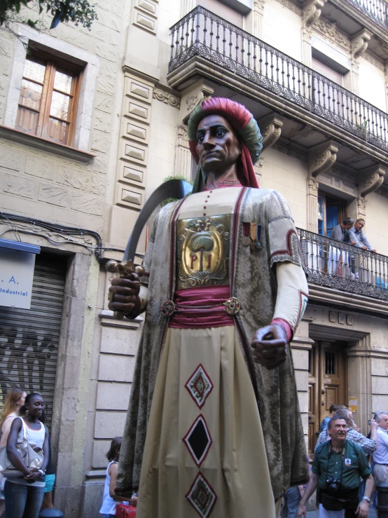 a statue dressed in an old roman costume