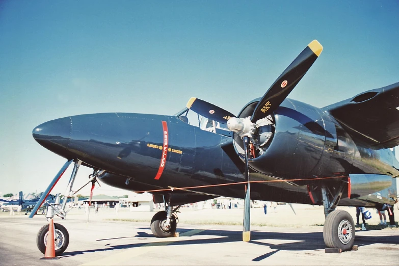 an old navy airplane that is on display