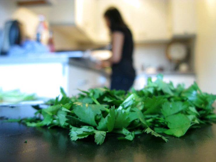 fresh lettuce being cut up on the counter