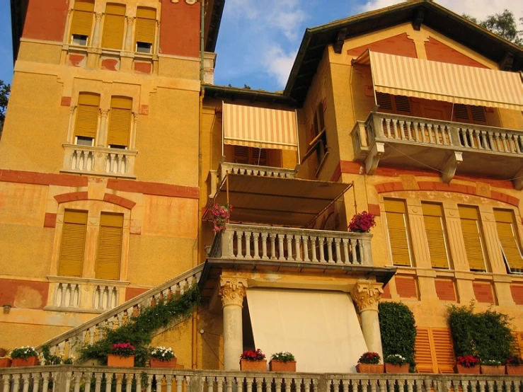 an apartment building with some balcony and balconies