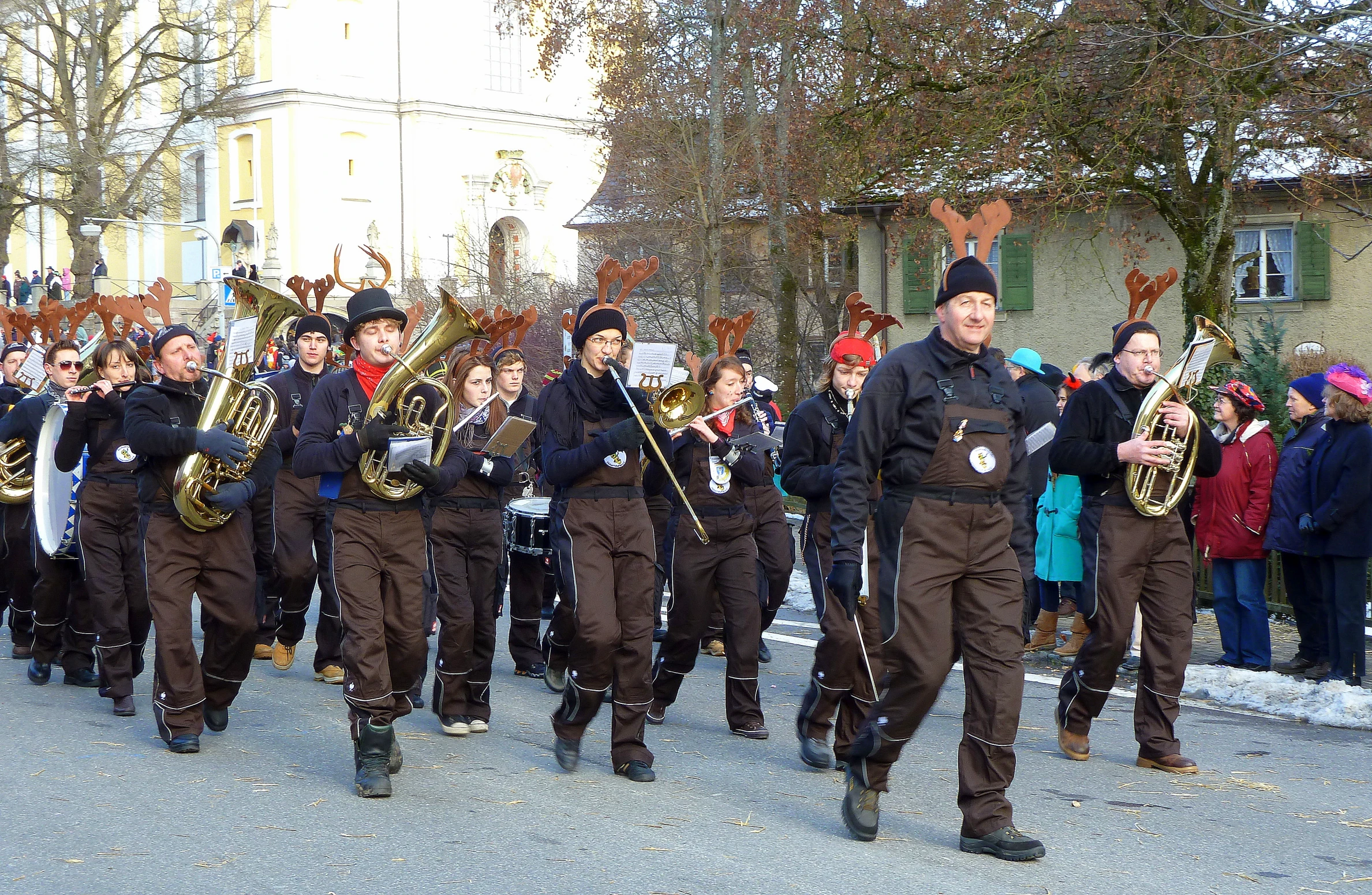 a band that is marching down the street